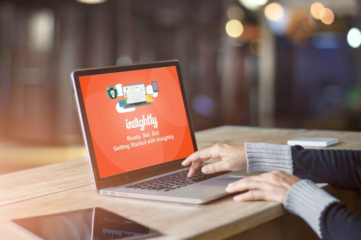 person using laptop | Lead Management Software Review | best lead management software