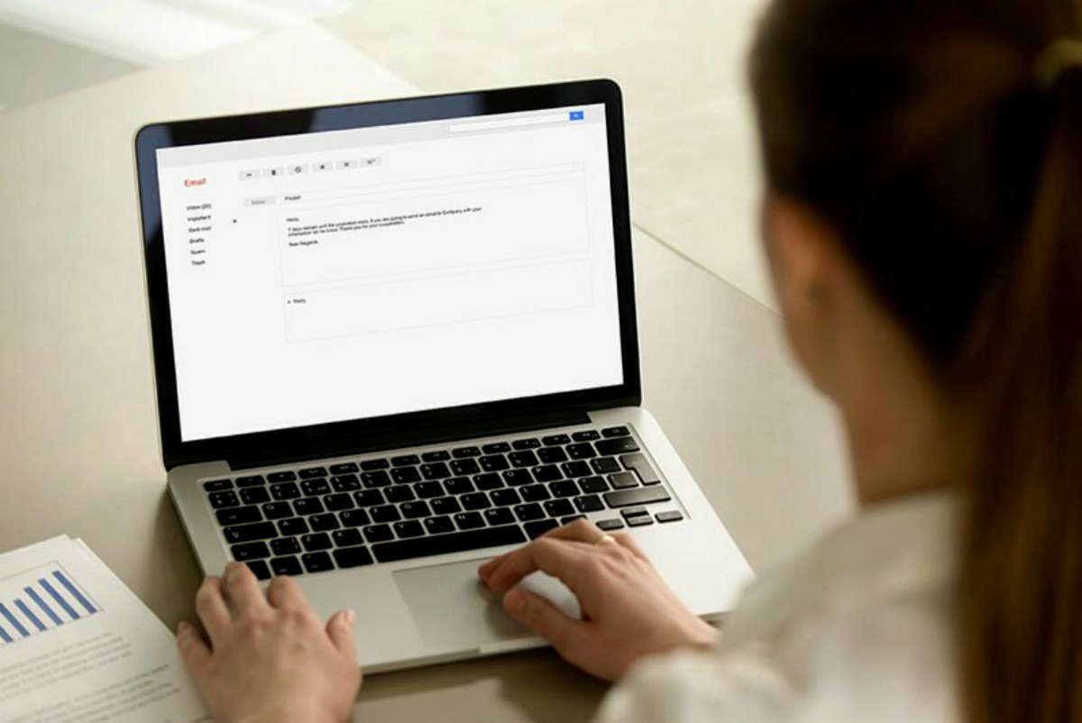 Woman typing email to client | Email Example #1 | Steps to Build Trust in 3 Minutes
