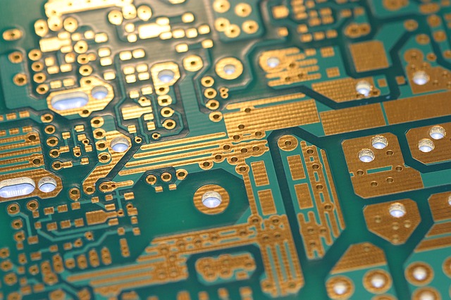 Artificial Intelligence with Neuralytics concept - green and gold circuits board